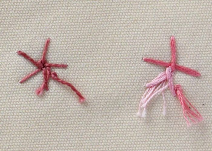 Fleurs tissées au point de roue araignée coton perlé rose et fil panaché, verso