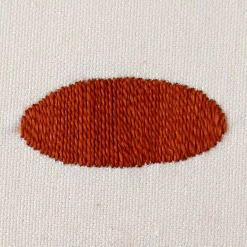 Surface Broderie au point de satin avec fils marron