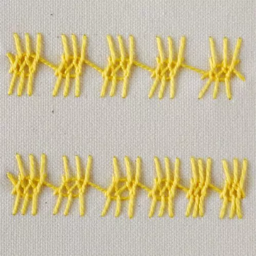 Broderie au point de crétois écossais avec des fils jaunes