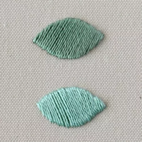 Broderie rembourrée au point de satin